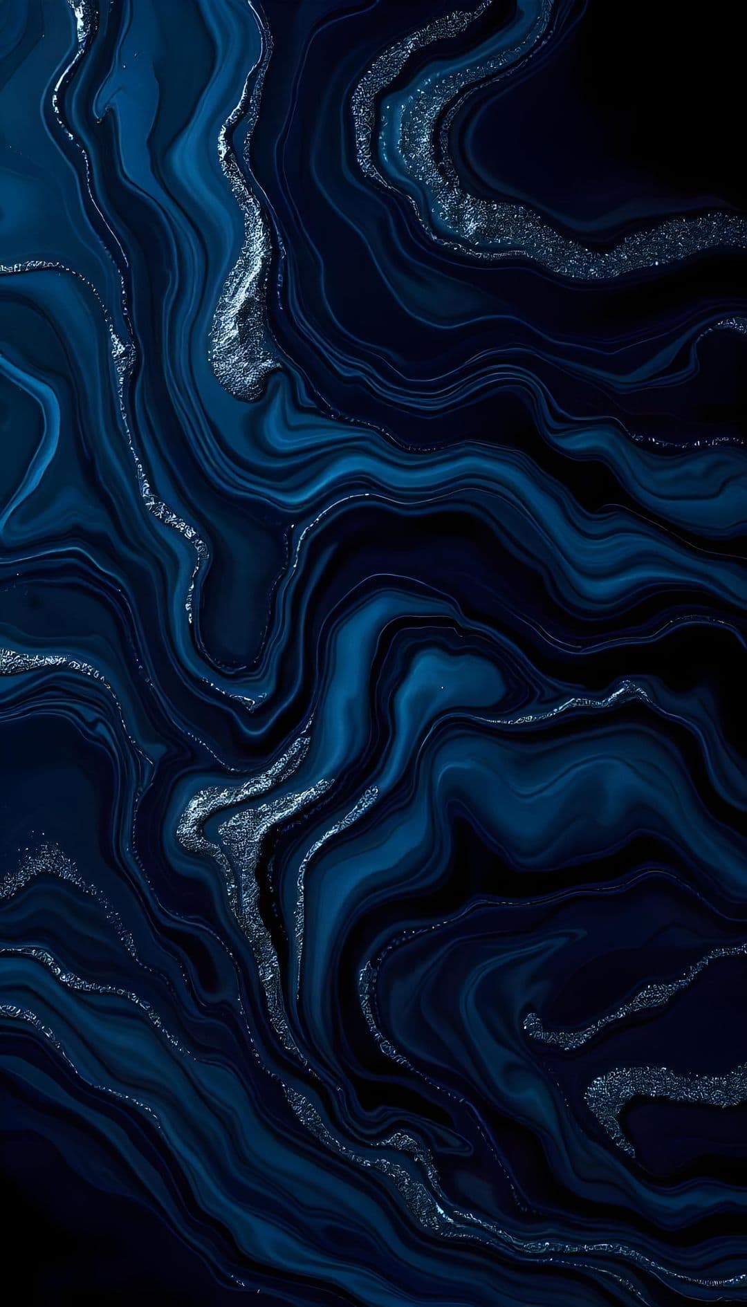 Abstract marble swirls in blues and blacks with silver veins