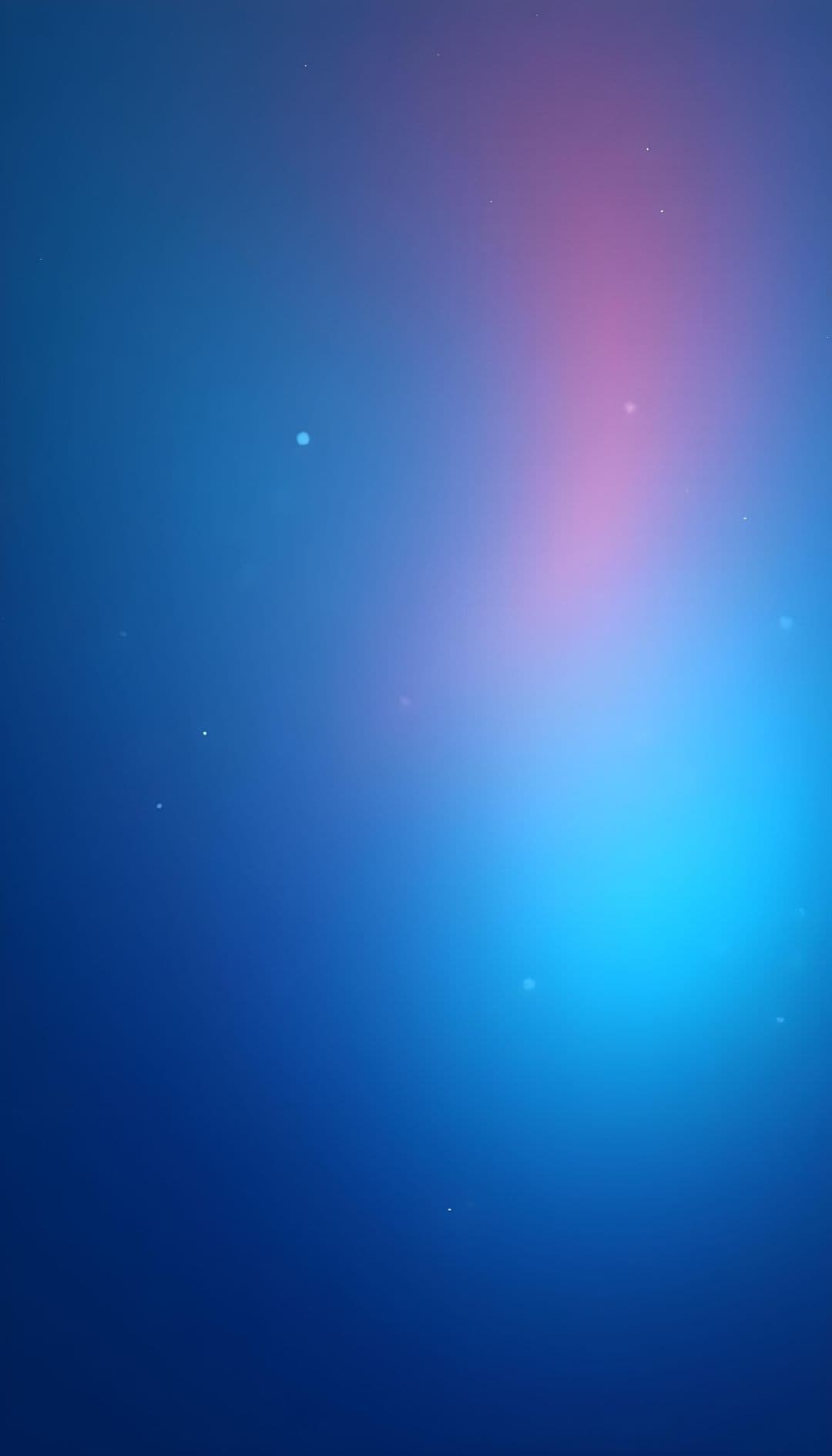 A gradient background from deep blue to pink with white specks resembling stars